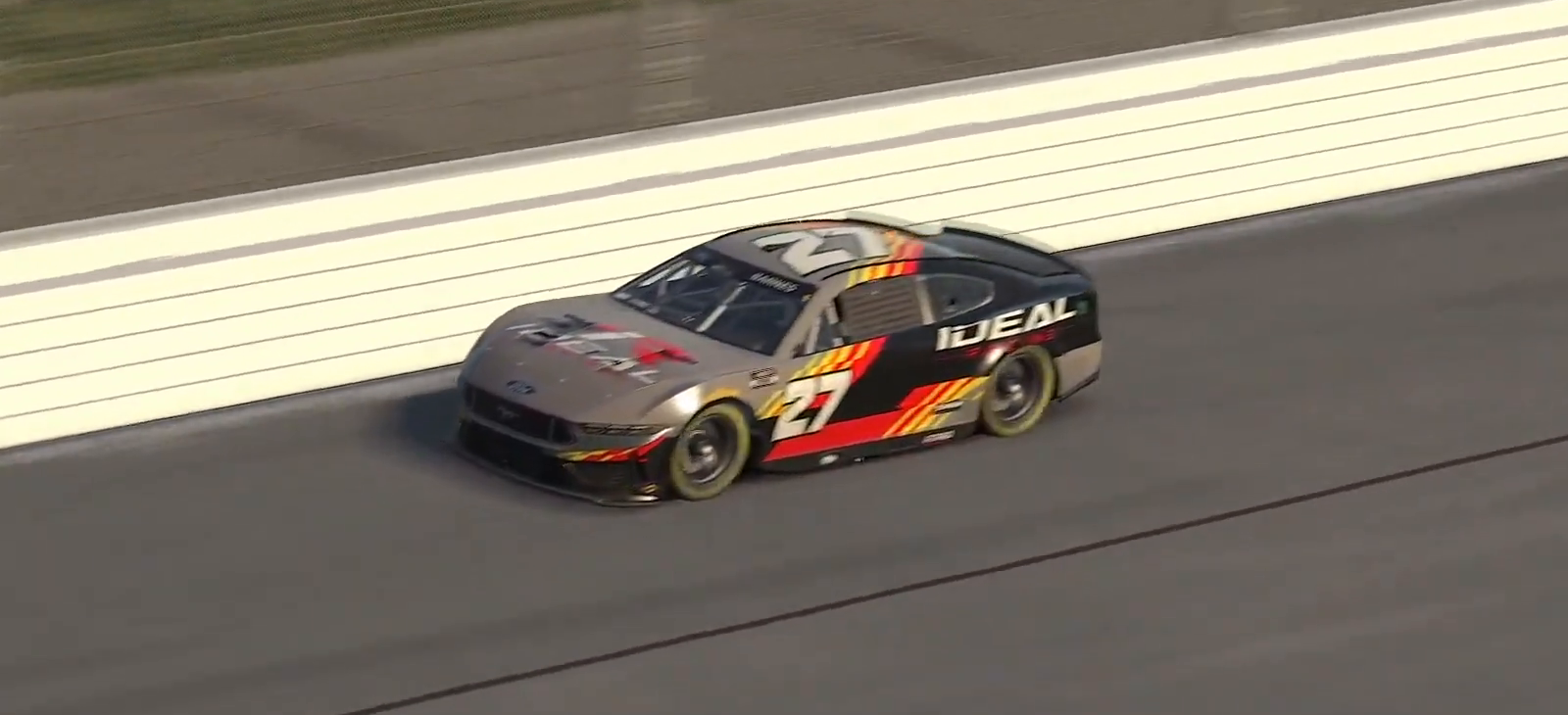 Christian Barnes' #27 crosses the finish line at Kansas Speedway.